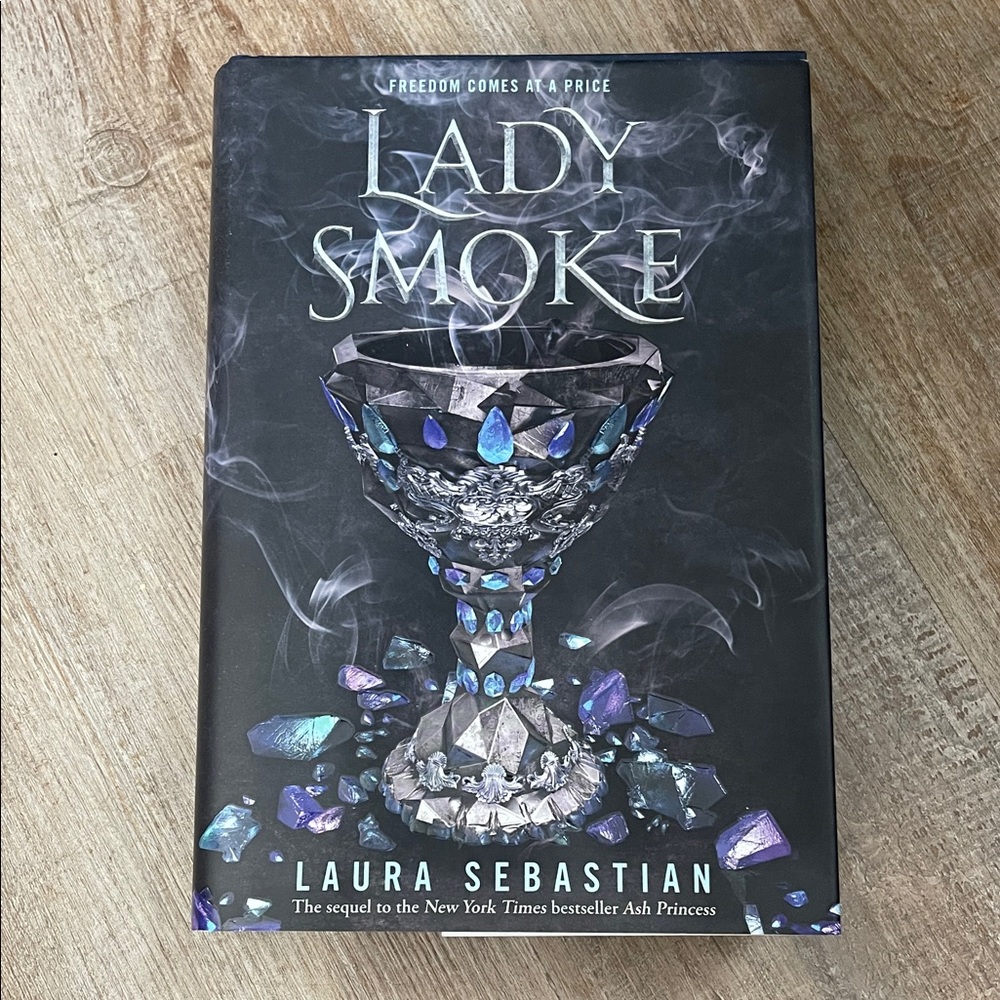 Lady Smoke by Laura Sebastian - Black Cover with Blue/Purple Accents